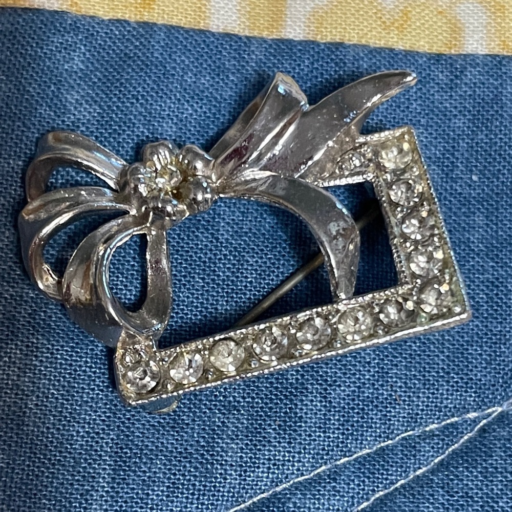 Vintage silver tone bow with rhinestones brooch